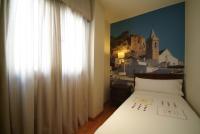 Posteľ alebo postele v izbe v ubytovaní Apartamentos Ardales