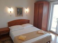 Posteľ alebo postele v izbe v ubytovaní Beautiful apartment on the beach