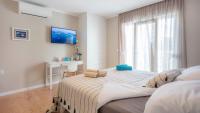 Posteľ alebo postele v izbe v ubytovaní Nikky’s BLUE DREAM Apartment