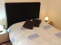 A bed or beds in a room at Apartamento Marina Nacional