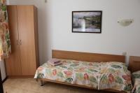 Postel nebo postele na pokoji v ubytování Hotel Radik