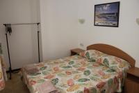 Postel nebo postele na pokoji v ubytování Hotel Radik