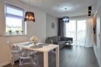 Posedenie v ubytovaní Funkcjonalne i Komfortowe Apartamenty Sun Seasons 24 w Kołobrzegu by Noclegi Renters