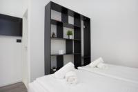 Posteľ alebo postele v izbe v ubytovaní SENZACIJA apartments