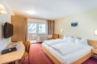 Telewizja i/lub zestaw kina domowego w obiekcie Hotel Garni Waldhof - Wohlfühlen am Lech