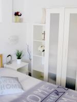 Postel nebo postele na pokoji v ubytování Malibu apartamento con campo de tennis y piscina con solarium