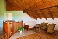 a living room with a couch and chairs at Villa Sole in Anse Volbert Village