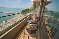 Люкс с 1 спальней и балконом — Бесплатный доступ в спа-центр и на пляж
