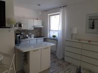 Kuchyň nebo kuchyňský kout v ubytování Apartament Leśny