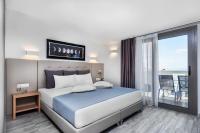 Posteľ alebo postele v izbe v ubytovaní Nymphes Deluxe Accommodation Pefkochori