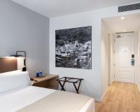 Postel nebo postele na pokoji v ubytování Alta House Begur