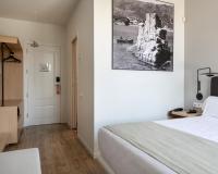 Postel nebo postele na pokoji v ubytování Alta House Begur
