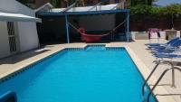 Bazén v ubytování Alekas Pool and Garden Home nebo v jeho okolí