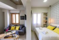 Postel nebo postele na pokoji v ubytování Candia Suites & Rooms