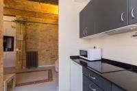 Kuchyň nebo kuchyňský kout v ubytování Apartamentos DV