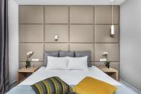 Posteľ alebo postele v izbe v ubytovaní Nymphes Deluxe Accommodation Pefkochori