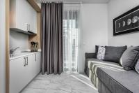 Posteľ alebo postele v izbe v ubytovaní Nymphes Deluxe Accommodation Pefkochori