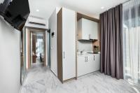 Kuchyňa alebo kuchynka v ubytovaní Nymphes Deluxe Accommodation Pefkochori