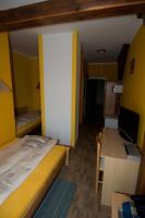 Postel nebo postele na pokoji v ubytování Hotel Na Hradbách