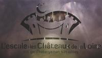 a poster for a movie with a smiling face at L&#39;Escale des Châteaux de la Loire in Angé