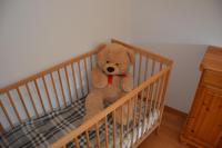 A bed or beds in a room at Ferienwohnung Schmetterling