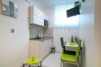 Kuchyňa alebo kuchynka v ubytovaní Apartman Elza