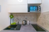 Kuchyňa alebo kuchynka v ubytovaní Apartman Elza
