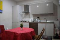 A kitchen or kitchenette at A due passi dal Duomo