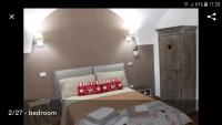 A bed or beds in a room at A due passi dal Duomo