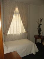 Ein Bett oder Betten in einem Zimmer der Unterkunft Willa Biala Lilia Old Town