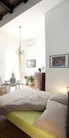 A bed or beds in a room at Napoli Pietrasanta LT