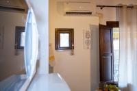 Łóżko lub łóżka w pokoju w obiekcie Casa Salinas Centro Storico
