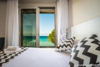 Posteľ alebo postele v izbe v ubytovaní Sunrise Rent Rooms