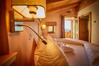 Posteľ alebo postele v izbe v ubytovaní Wallegg Lodge - Alpine Premium Chalet - Ski In-Ski Out - Real Alpine Location Saalbach
