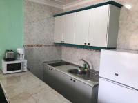 Kuchyň nebo kuchyňský kout v ubytování Apartamentos Aloe