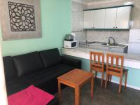 Kuchyň nebo kuchyňský kout v ubytování Apartamentos Aloe