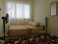 A1-04-03 Damiana Apartmentにあるベッド
