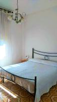 A bed or beds in a room at The Garden
