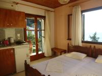 A bed or beds in a room at Studios Andreas