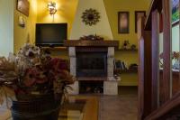 Televízia a/alebo spoločenská miestnosť v ubytovaní Country house Santa Lucia
