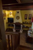 Televízia a/alebo spoločenská miestnosť v ubytovaní Country house Santa Lucia