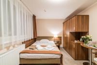Postel nebo postele na pokoji v ubytování Hotel Polanica Resort & Spa