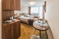Postel nebo postele na pokoji v ubytování Hotel Polanica Resort & Spa