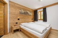 Posteľ alebo postele v izbe v ubytovaní Residence Rottonara