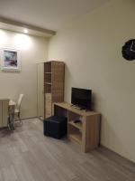 Televízia a/alebo spoločenská miestnosť v ubytovaní Apartament Blue