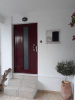 Televízia a/alebo spoločenská miestnosť v ubytovaní Limanaki Ss View Apartment