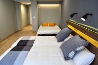 Posteľ alebo postele v izbe v ubytovaní Hotel Alda Sada Marina