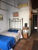 Hotel Posada del Bandoleroにあるベッド