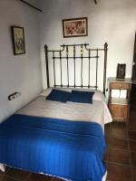 Hotel Posada del Bandoleroにあるベッド