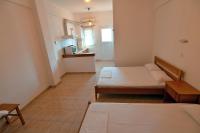 Postel nebo postele na pokoji v ubytování Camping Orpheus Apartments